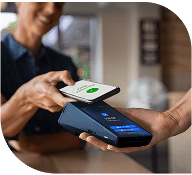 A person paying for something with their phone.