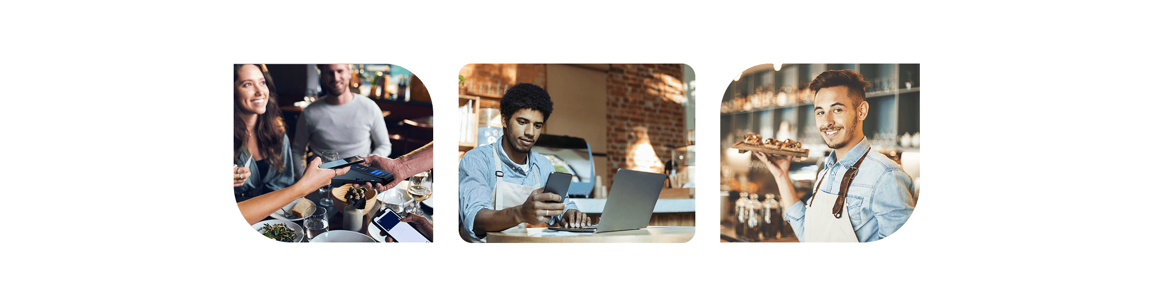 A man sitting at a table with two laptops.