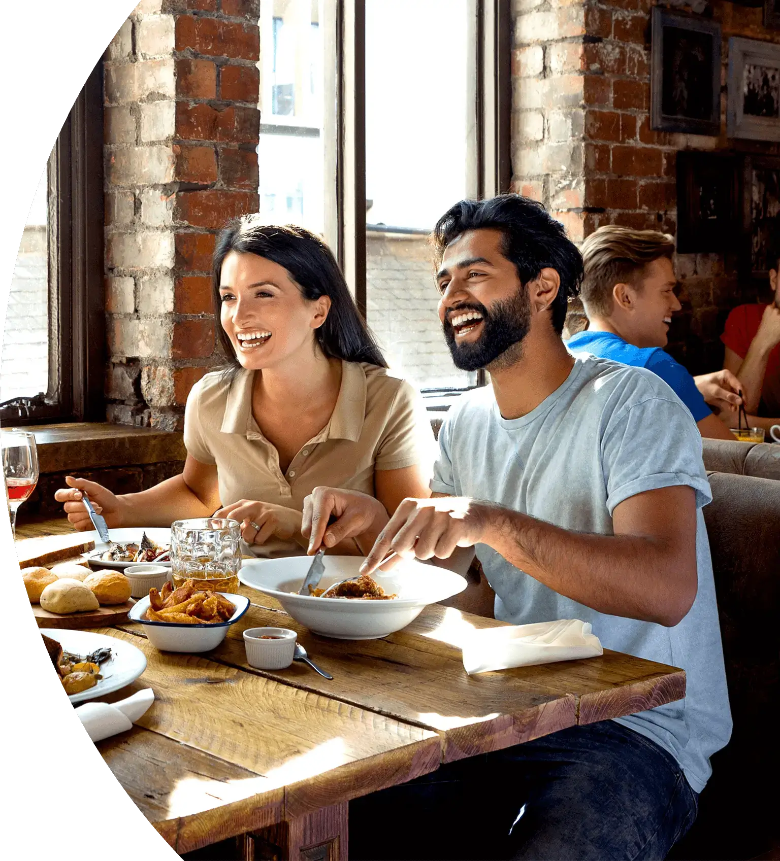 People enjoying a meal at a restaurant.