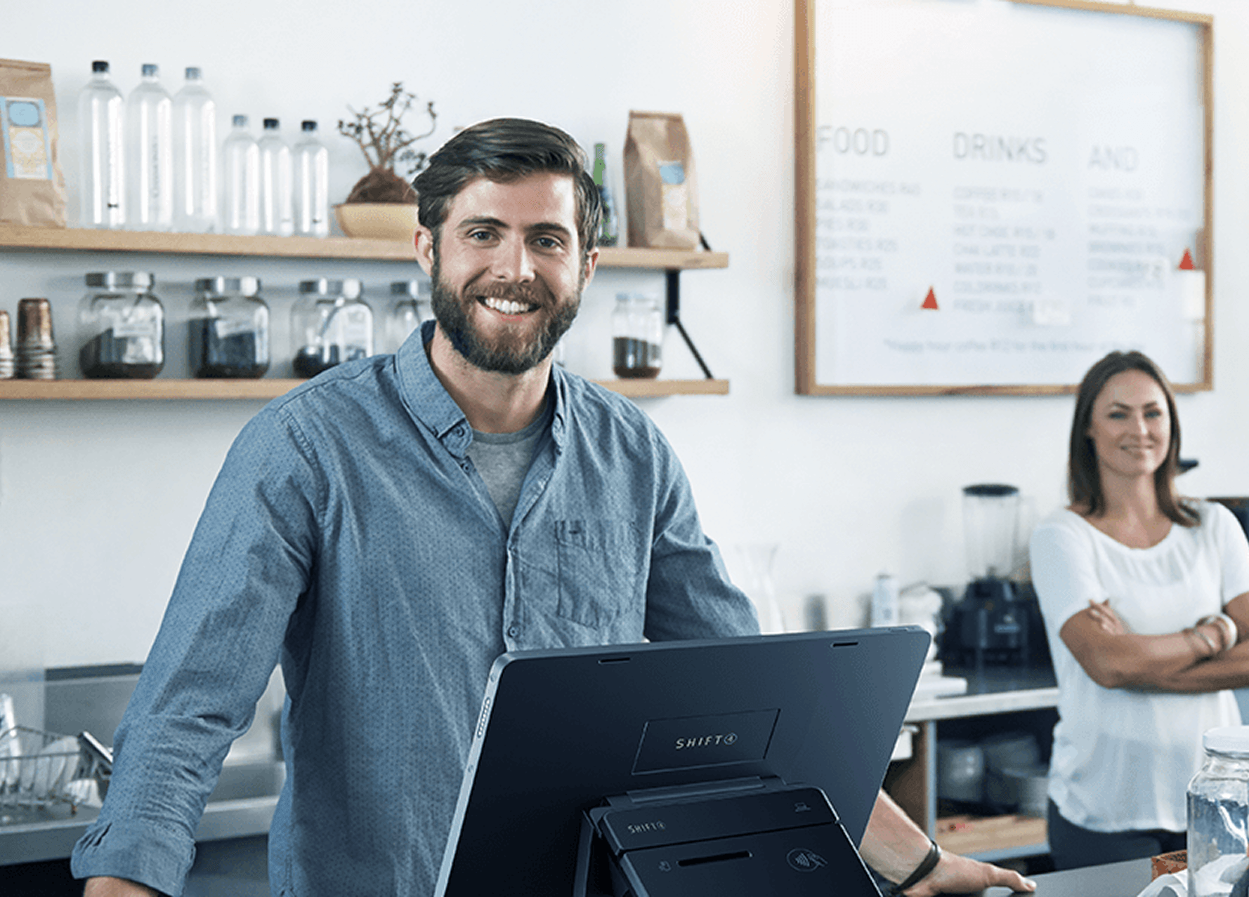 Barista at work in modern coffee shop