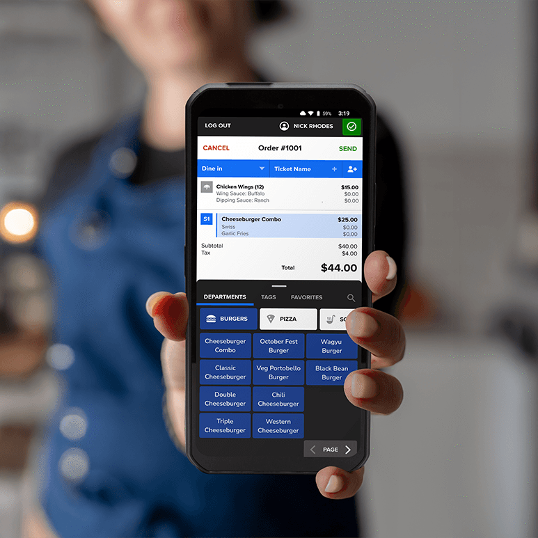 Person holding smartphone with restaurant order screen.
